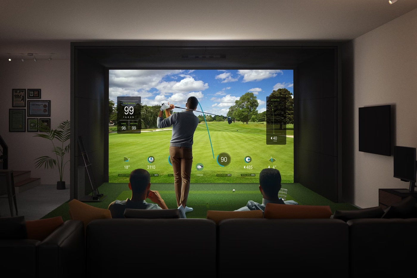 Indoor golf simulator setup with screen displaying course - Sim Nation Golf