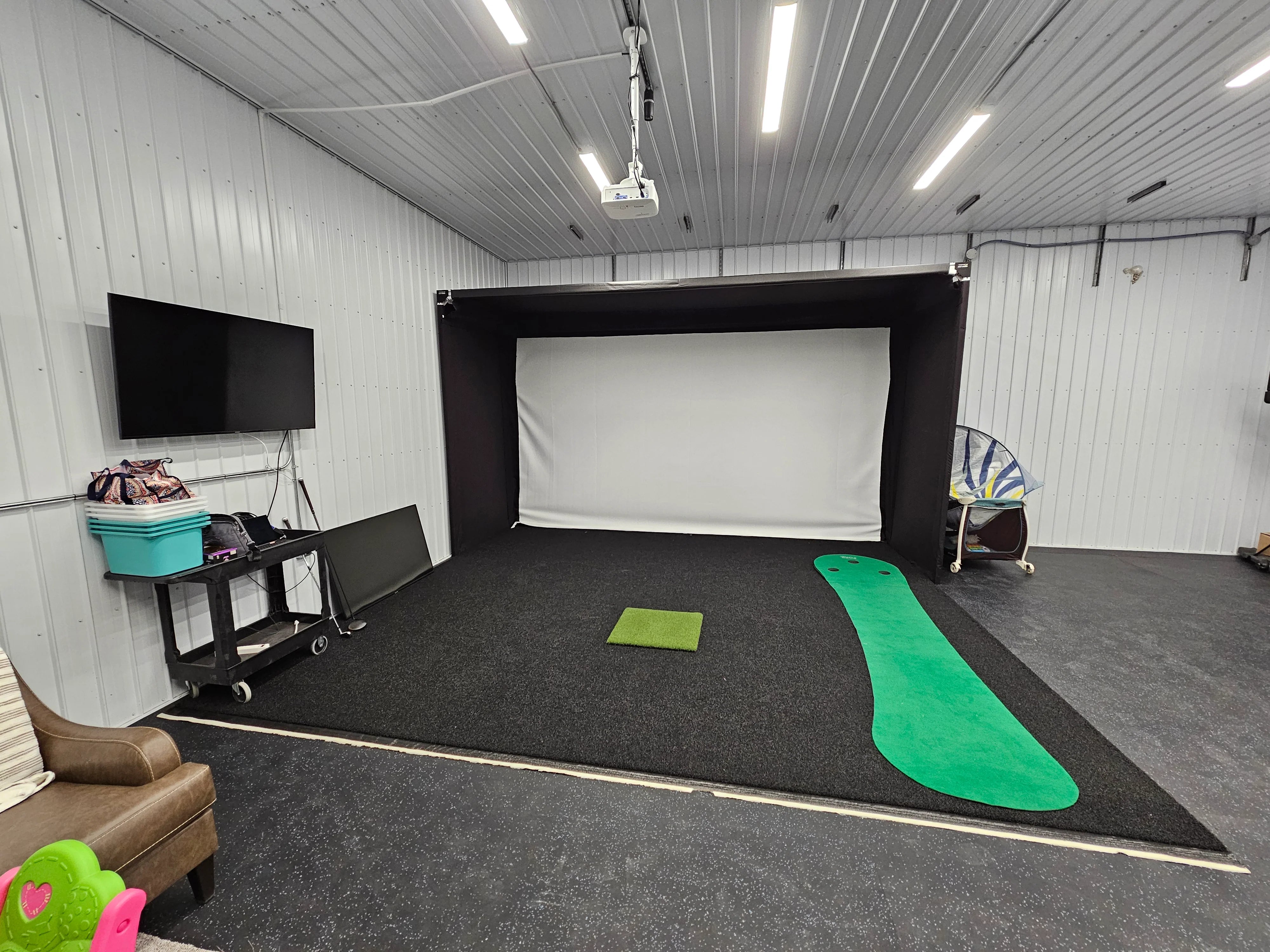 Indoor golf simulator The SportScreen enclosure.