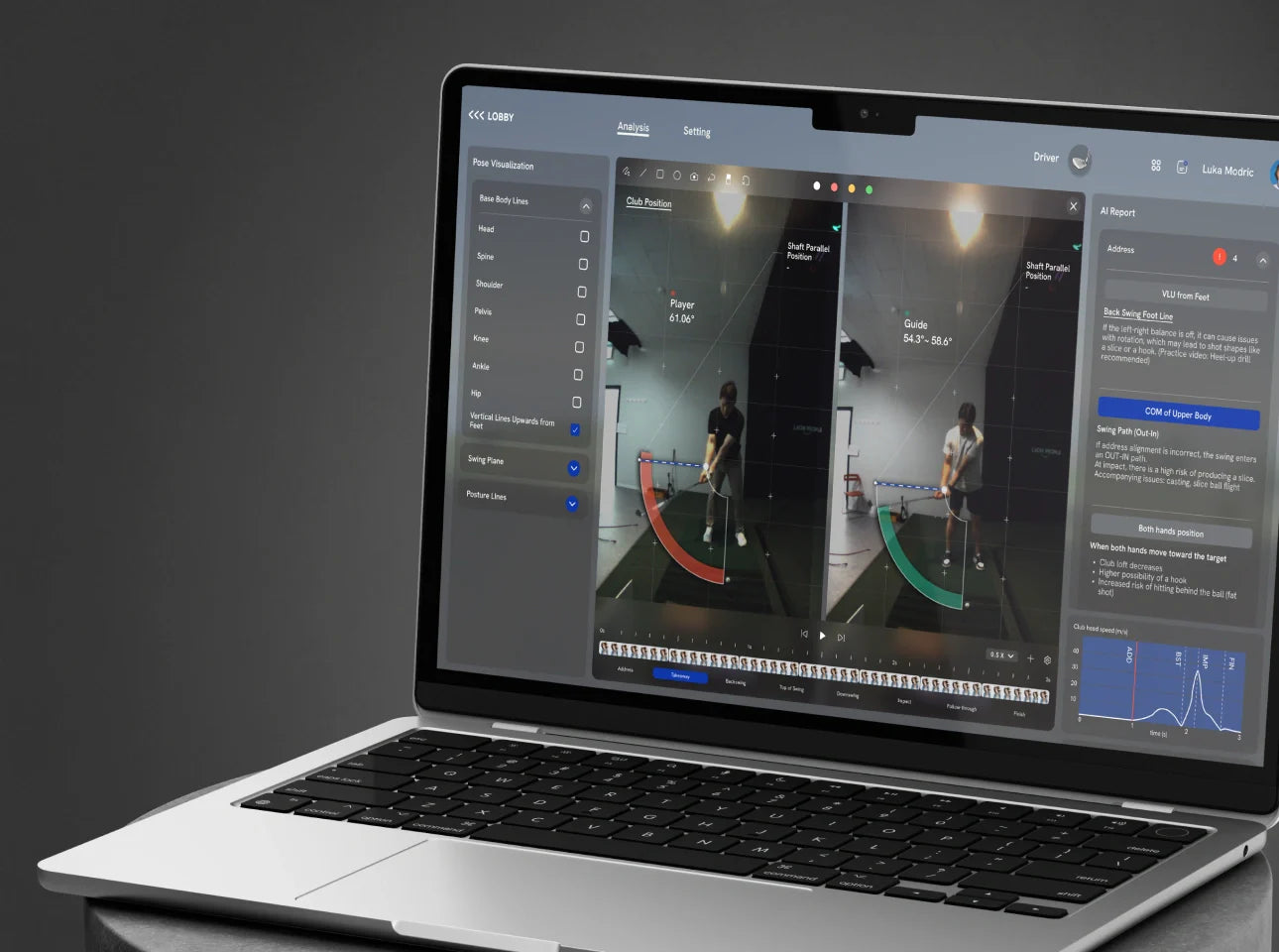 Laptop displaying VTrack golf simulator SwingEZ software.